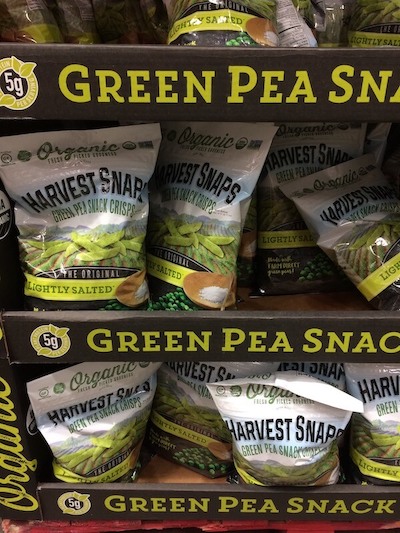 Bags of Harvest Snaps Green Pea Snap Crisps at Costco.