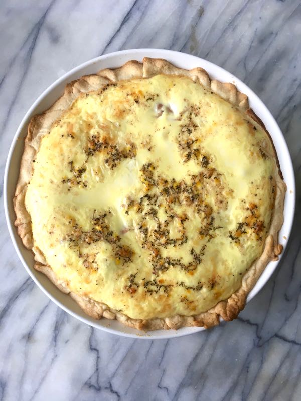 An overhead shot of a simple ham and cheese quiche recipe.