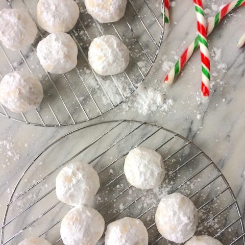 These nut-free snowball cookies are a Christmas cookie classic, but without the nuts. Buttery, sugary, delicious bites of awesome. #nutfree #christmascookies | flavorpalooza.com