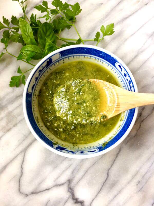 A flavor-packed nut free pesto that's perfect for pasta, pizza, soups -- you name it! #Vegan option. #nutfree #pesto | flavorpalooza.com