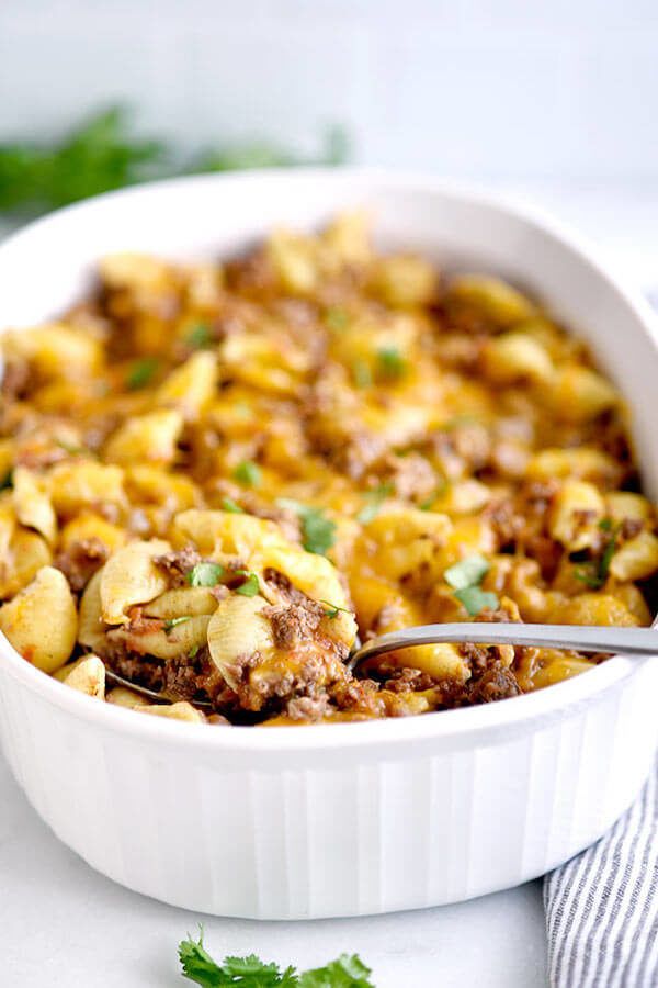 This 5-ingredient, cheesy taco pasta casserole is one of those tried and true recipes you can doctor up according to what you have on hand or enjoy it as an easy weeknight dinner without all the extras.