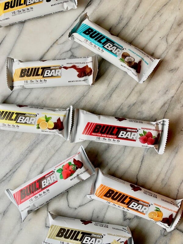 A variety of Built Bars scattered on a countertop.